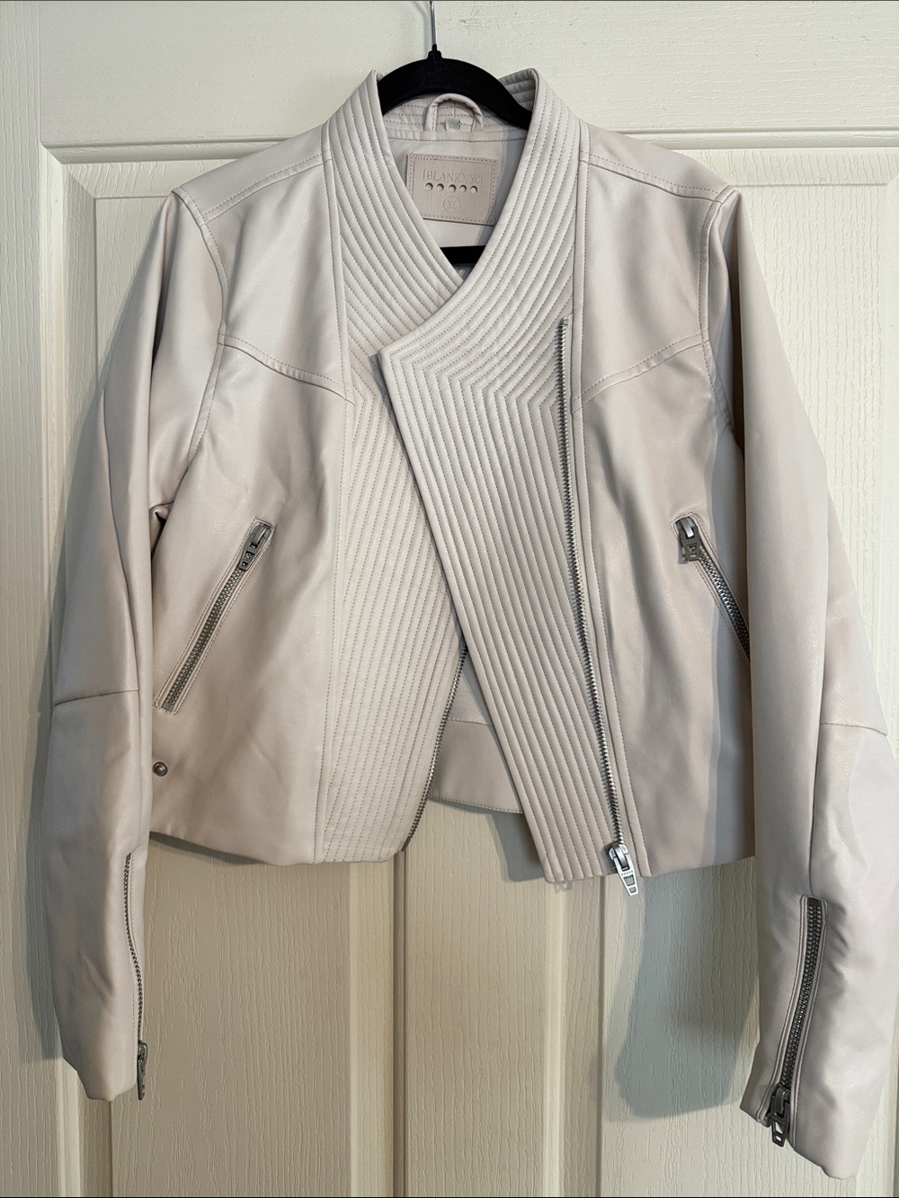 Blank NYC Cream Vegan Leather Moto Jacket with Detailed Stitching